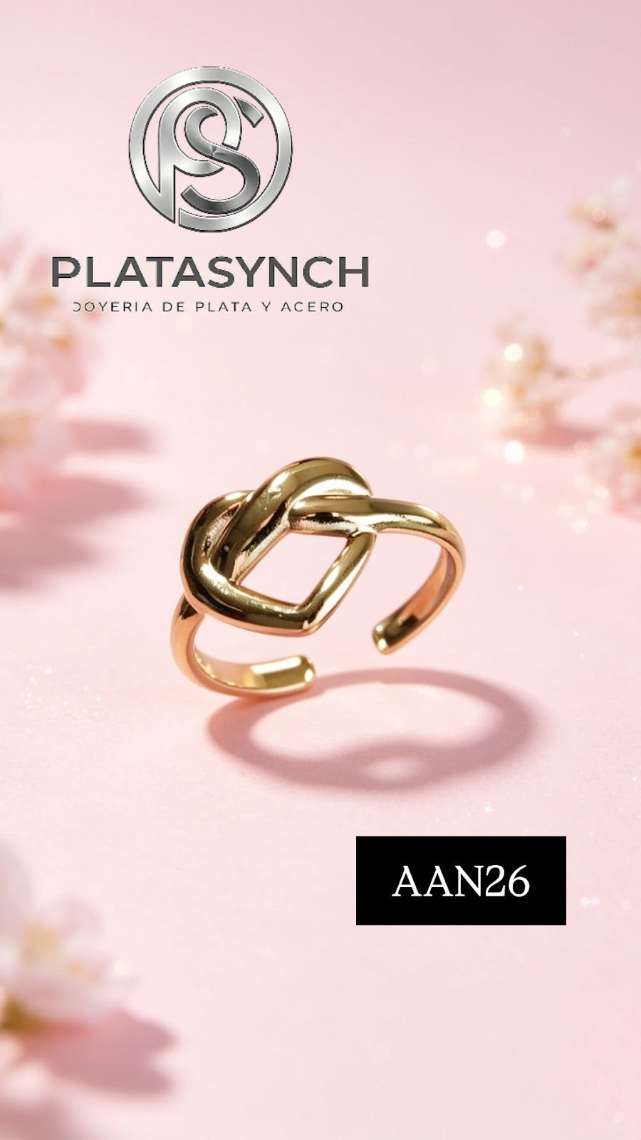 AAN26 - Anillo Acero Dorado, Corazon cruzado