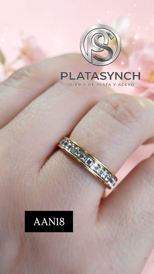 AAN18 - Anillo Acero Dorado circoneas cubicas