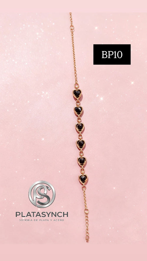 BP10 - Pulcera brass de corazones con piedra negra